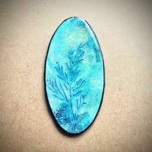 pendentif décor réalisé avec tampon spécial pâte polymère